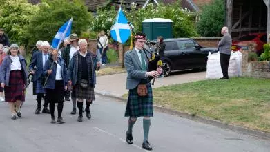 Piper leading the Harwell procession